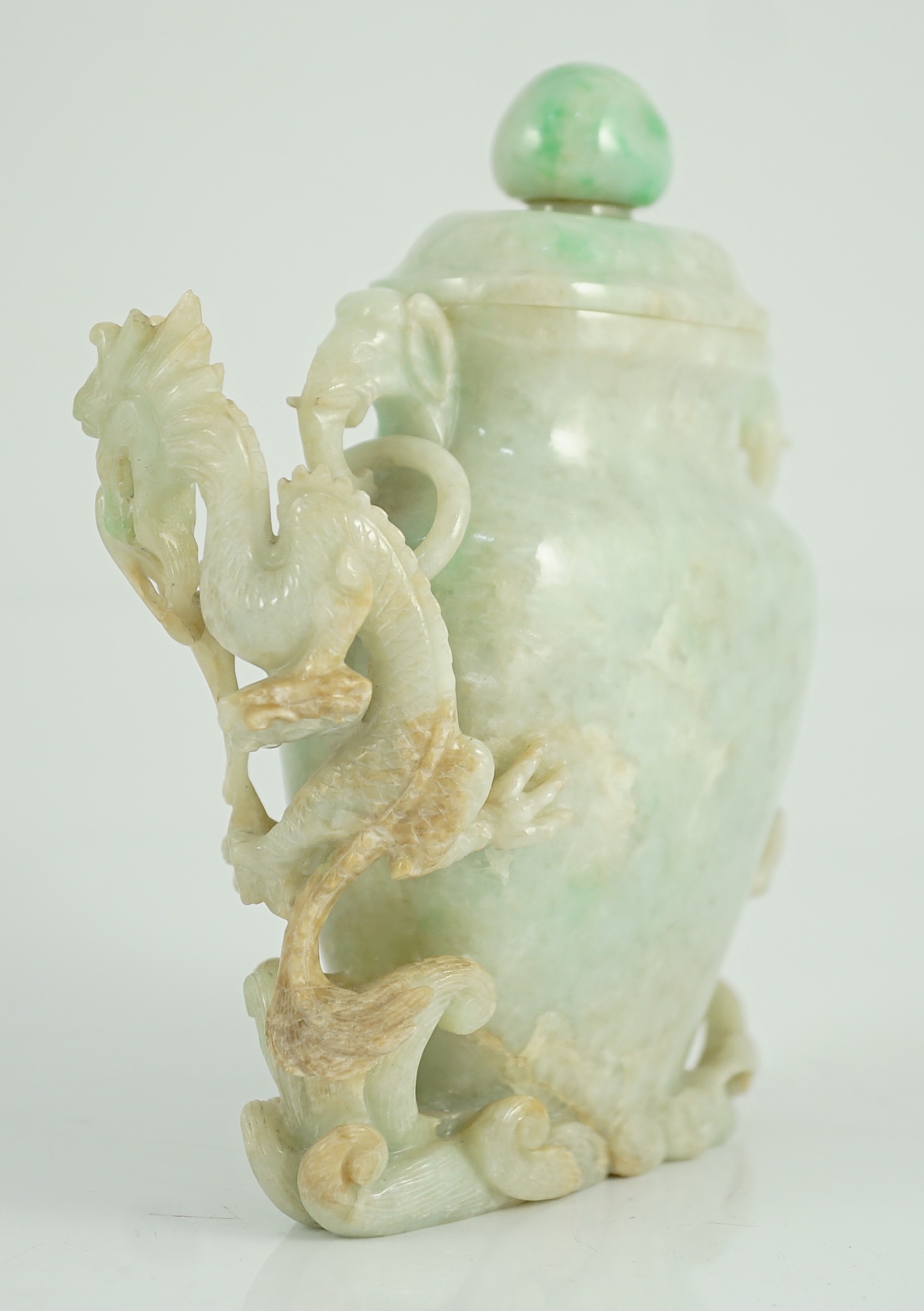 A Chinese jadeite 'dragon' vase and cover, late 19th/early 20th century, 15.3cm high, horn tips and one ring lacking